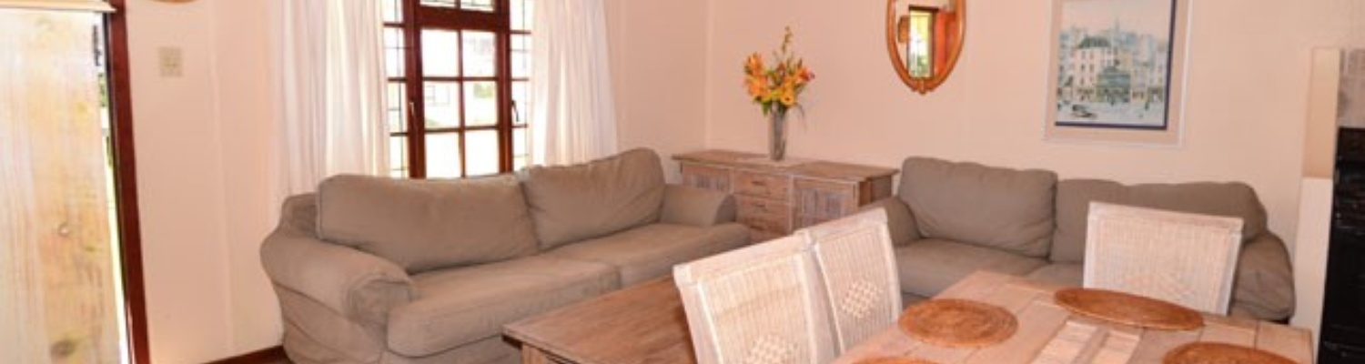 Lounge area of cottage 78,self catering beach cottages,beach cottage,fish hoek chalets,things to do in fish hoek